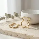 Pendientes aro trenzado forma Oso Ins Tous-02.webp