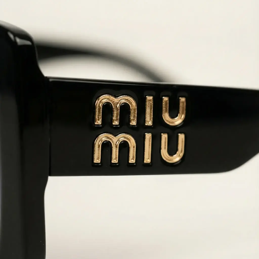 Gafas de sol Miu Miu MU 10 YS 06 copia.webp