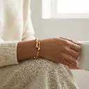 Pulseras cartier forma de clavo dorado 01.webp