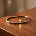 Pulseras cartier forma de clavo dorado 07.webp