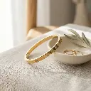 Pulsera estilo cartier motivo de tornillos dorado 03.webp