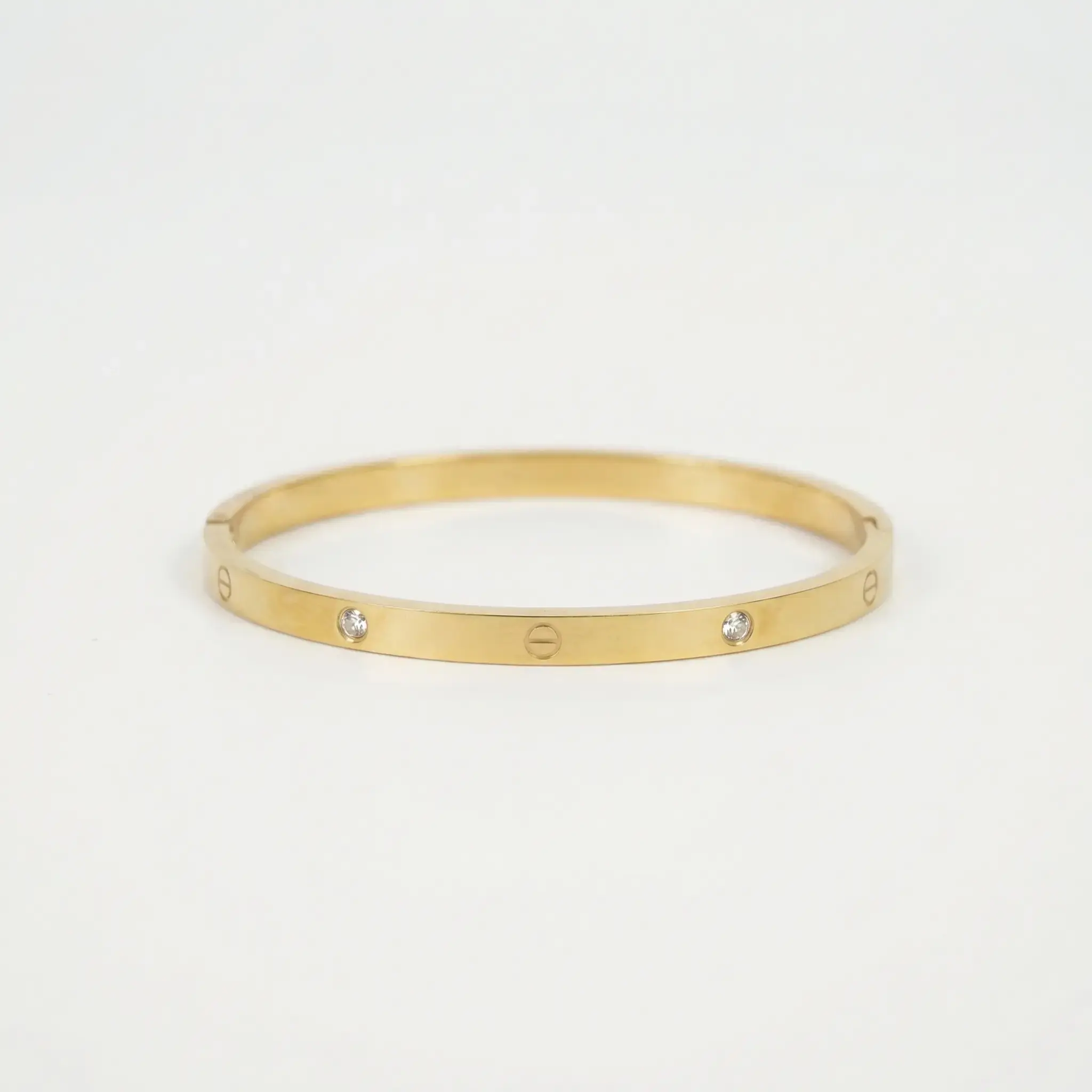 Pulsera estilo cartier motivo de tornillos dorado 01.webp