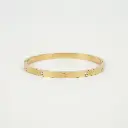 Pulsera estilo cartier motivo de tornillos dorado 01.webp