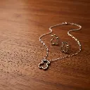 Conjunto colgante con pulsera y pendientes oso silueta (Inspiracion Tous) 03.webp