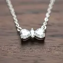 Collar Forma de Moño Plata 03.webp