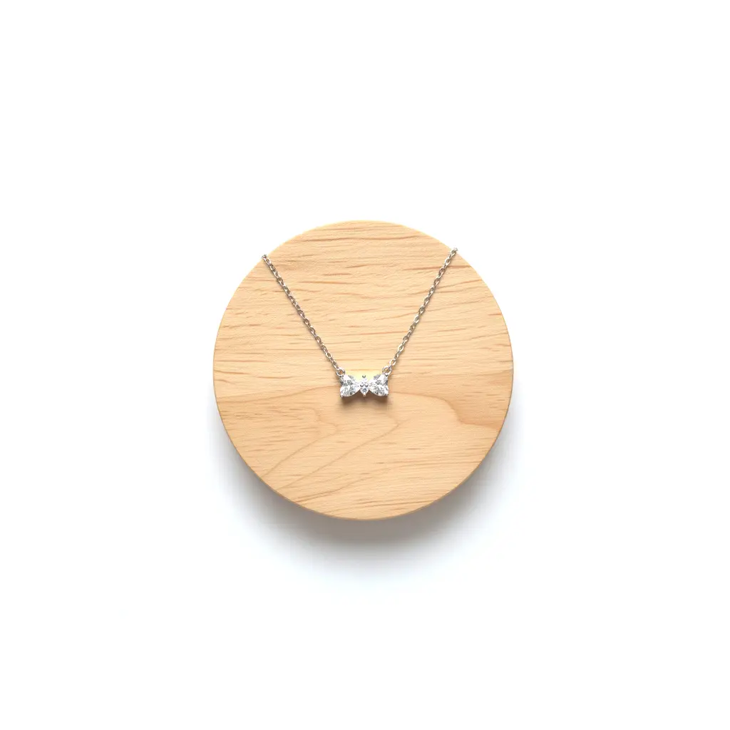 Collar Forma de Moño Plata 01.webp