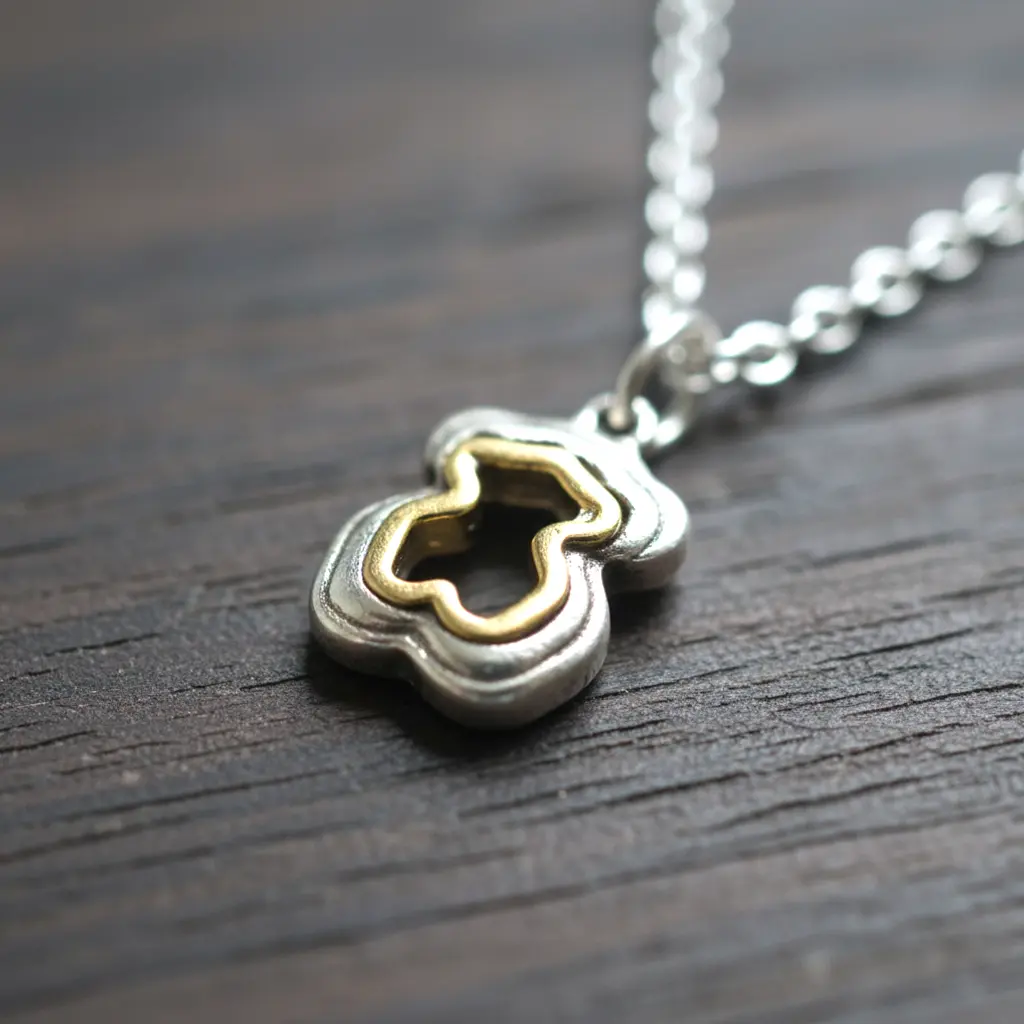 Collar Oso Triple Dorado y Plata Tous 002.webp