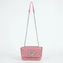 Bolso de hombro broche central circular