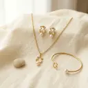 Conjunto pulsera rigida con colgante y pendientes perla (Inspiración Tous)